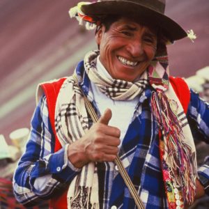 Peruvian native giving thumbs up and smiling